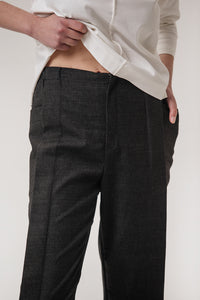 b Pants with pleats